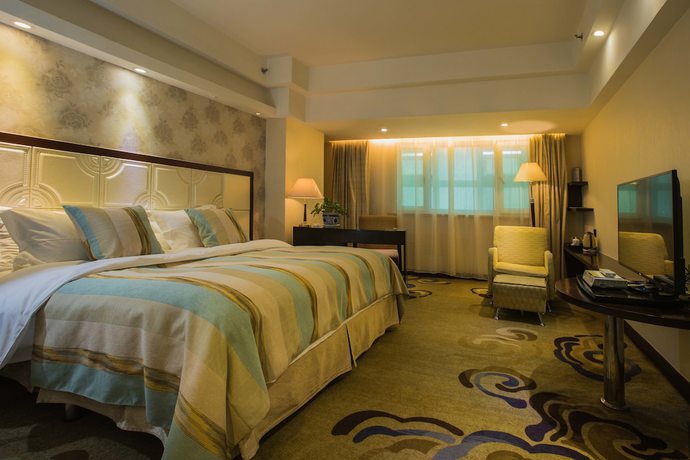 Imagen de la habitación del Hotel Excemon Xinjiang Yilite. Foto 11