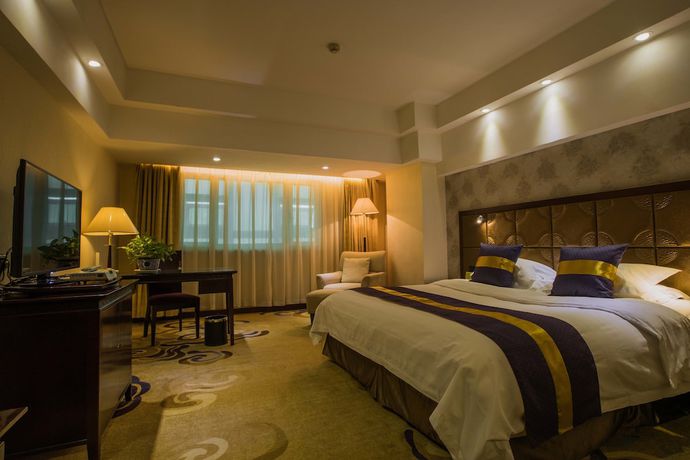 Imagen de la habitación del Hotel Excemon Xinjiang Yilite. Foto 13