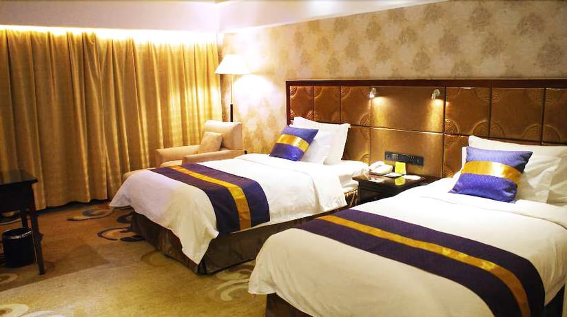 Imagen de la habitación del Hotel Excemon Xinjiang Yilite. Foto 14