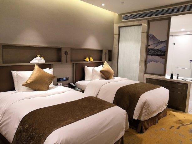 Imagen de la habitación del Hotel Excemon Yuyao Yulan. Foto 4