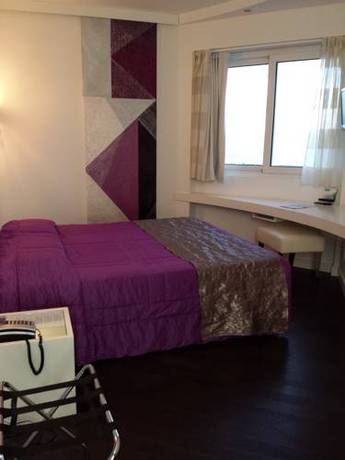 Imagen de la habitación del Hotel Exclusive. Foto 5