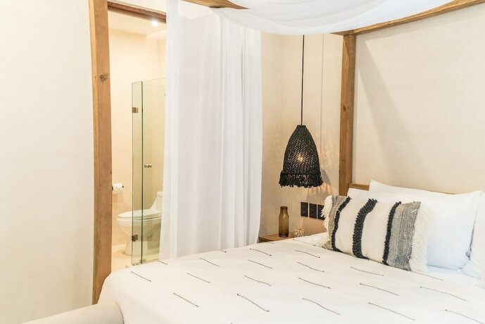 Imagen general del Hotel Exclusive Luxurious 2 Apartments Aldea Zama Private Pool Jacuzzi Uncovered Patio. Foto 11