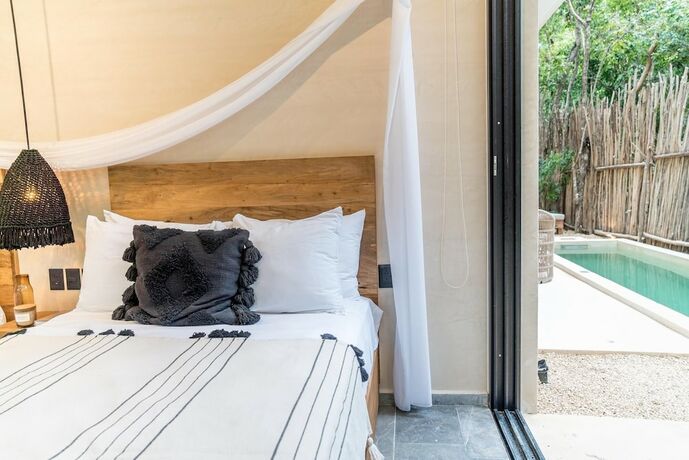 Imagen general del Hotel Exclusive Luxurious 2 Apartments Aldea Zama Private Pool Jacuzzi Uncovered Patio. Foto 13