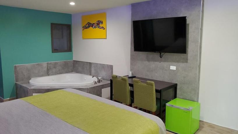 Imagen de la habitación del Hotel Exclusivo Inn and Suites. Foto 3