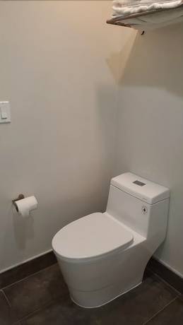 Imagen de la habitación del Hotel Exclusivo Inn and Suites. Foto 9