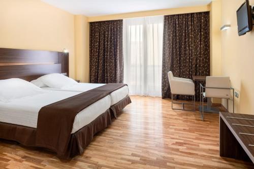 Imagen de la habitación del Hotel Exe Do&ntilde;a Carlota. Foto 8
