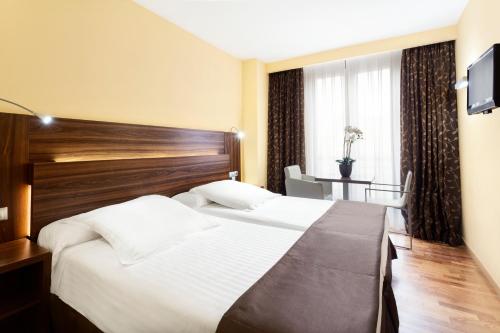 Imagen de la habitación del Hotel Exe Do&ntilde;a Carlota. Foto 21