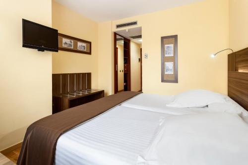 Imagen de la habitación del Hotel Exe Do&ntilde;a Carlota. Foto 22