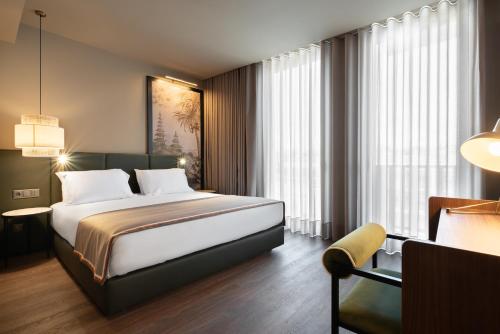 Imagen de la habitación del Hotel Exe Essenzia Porto. Foto 4