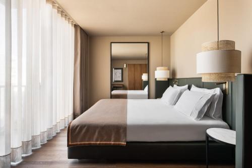 Imagen de la habitación del Hotel Exe Essenzia Porto. Foto 5