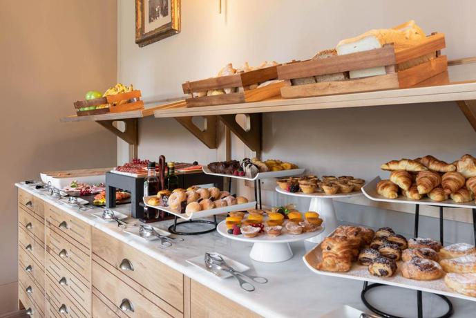 Imagen del bar/restaurante del Hotel Exe Essenzia Porto. Foto 3