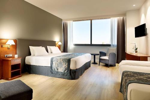 Imagen de la habitación del Hotel Exe Isla Cartuja. Foto 8