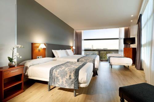 Imagen de la habitación del Hotel Exe Isla Cartuja. Foto 9