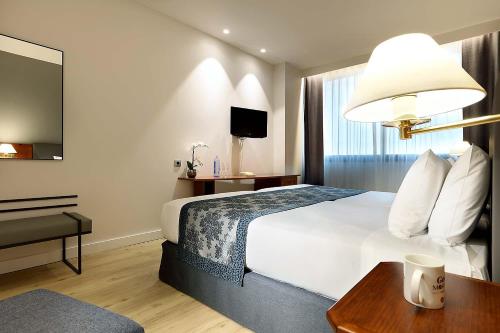 Imagen de la habitación del Hotel Exe Isla Cartuja. Foto 12