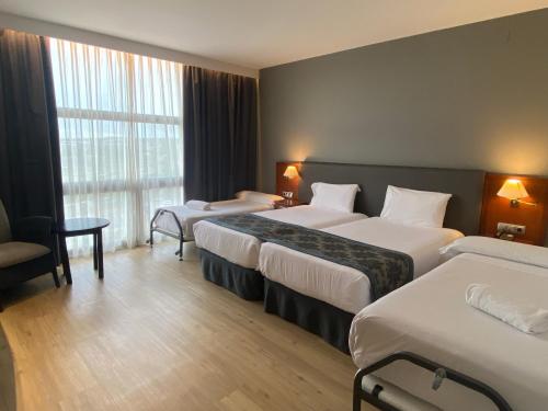 Imagen de la habitación del Hotel Exe Isla Cartuja. Foto 16