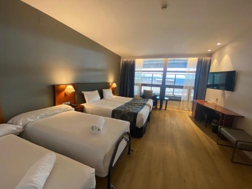 Imagen de la habitación del Hotel Exe Isla Cartuja. Foto 17