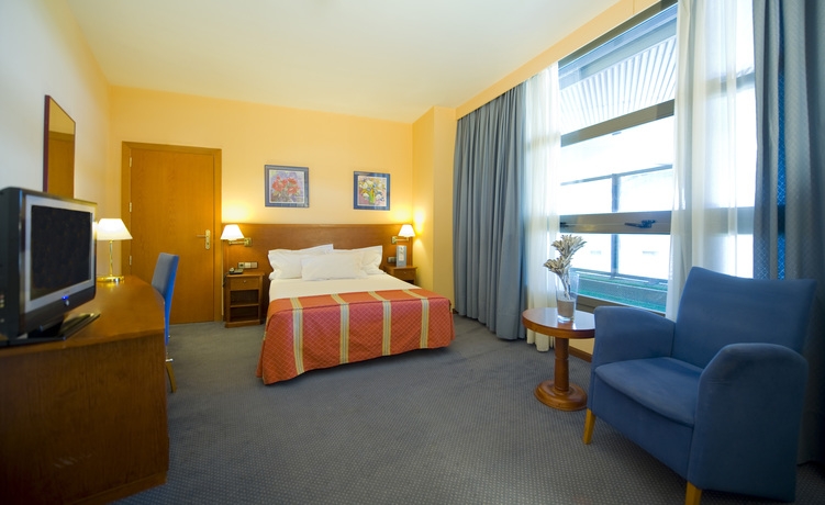 Imagen de la habitación del Hotel Exe Isla Cartuja. Foto 7