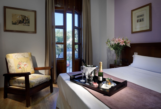 Imagen de la habitación del Hotel Exe Triunfo. Foto 10