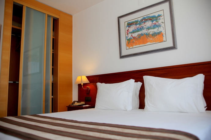 Imagen de la habitación del Hotel Exe Wellington. Foto 10