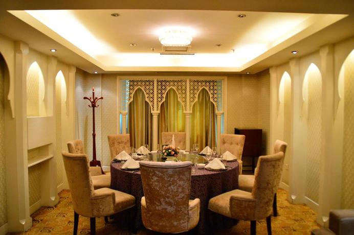 Imagen del bar/restaurante del Hotel Execemon Xinjiang Yilite Hotel. Foto 7