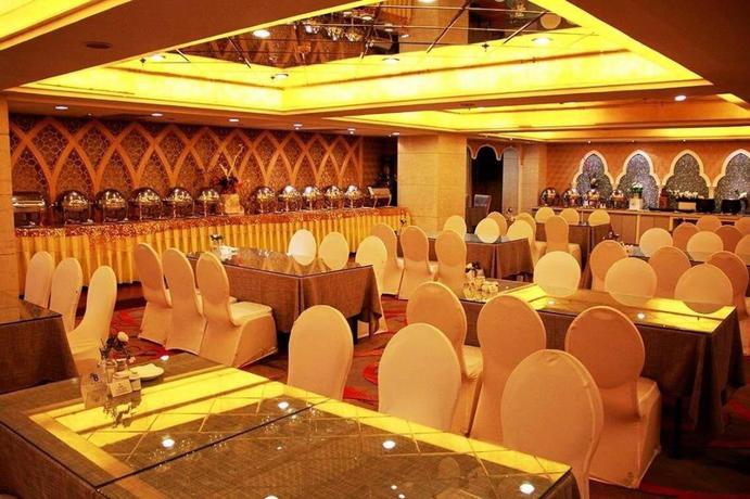 Imagen del bar/restaurante del Hotel Execemon Xinjiang Yilite Hotel. Foto 8