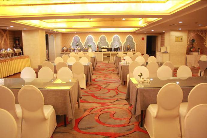 Imagen del bar/restaurante del Hotel Execemon Xinjiang Yilite Hotel. Foto 9