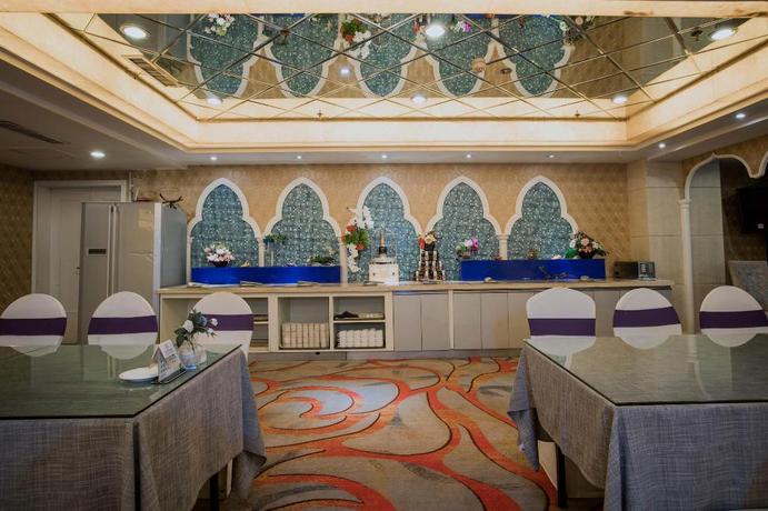 Imagen del bar/restaurante del Hotel Execemon Xinjiang Yilite Hotel. Foto 10