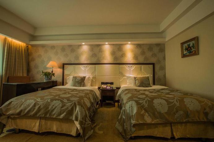 Imagen de la habitación del Hotel Execemon Xinjiang Yilite Hotel. Foto 11