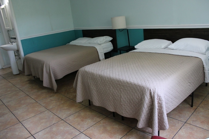 Imagen de la habitación del Hotel Executive Economy Lodge. Foto 3