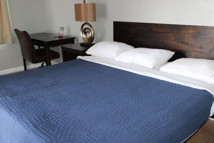 Imagen de la habitación del Hotel Executive Economy Lodge. Foto 10