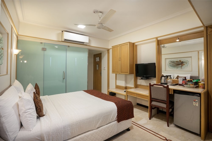 Imagen de la habitación del Hotel Executive Enclave. Foto 7