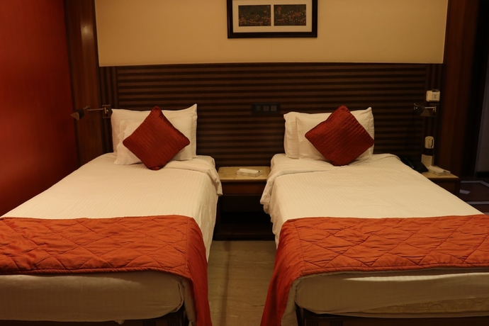 Imagen de la habitación del Hotel Executive Enclave. Foto 9