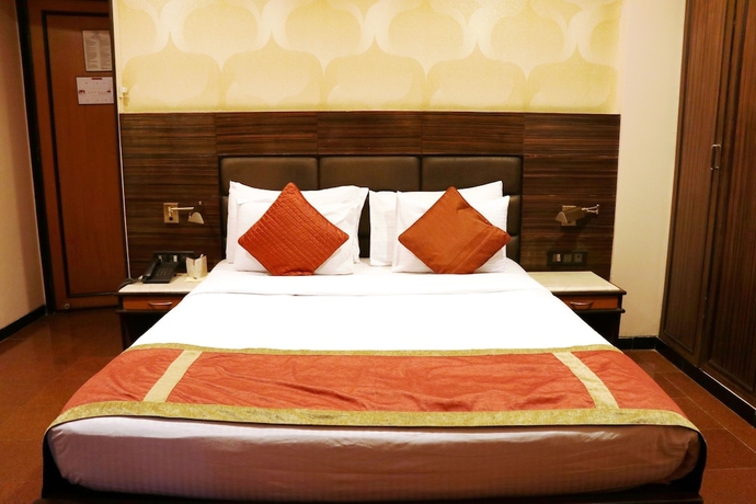 Imagen de la habitación del Hotel Executive Enclave. Foto 16