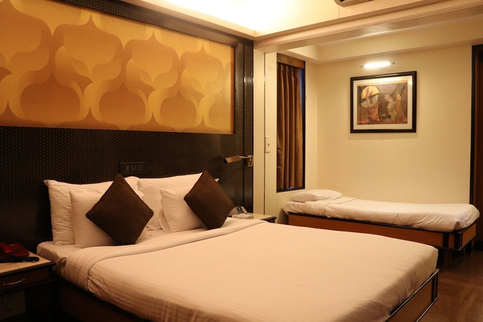 Imagen de la habitación del Hotel Executive Enclave. Foto 17