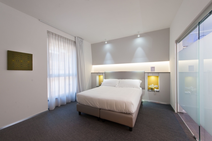 Imagen de la habitación del Hotel Executive Inn Boutique. Foto 5