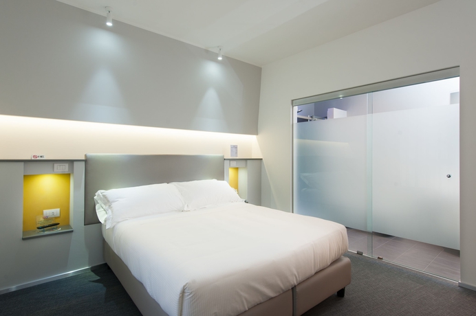 Imagen de la habitación del Hotel Executive Inn Boutique. Foto 6