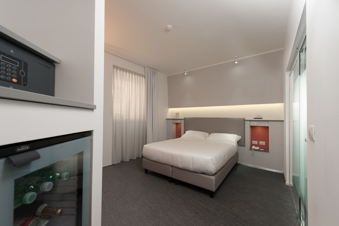 Imagen de la habitación del Hotel Executive Inn Boutique. Foto 8