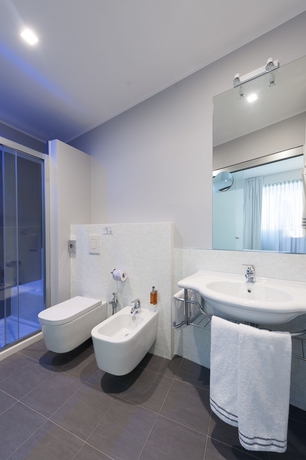 Imagen de la habitación del Hotel Executive Inn Boutique. Foto 12