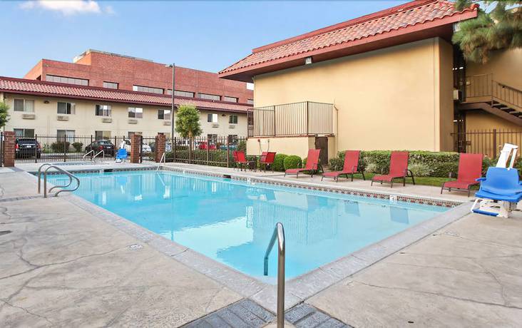 Imagen de la piscina del Hotel Executive Inn, Groves . Foto 12