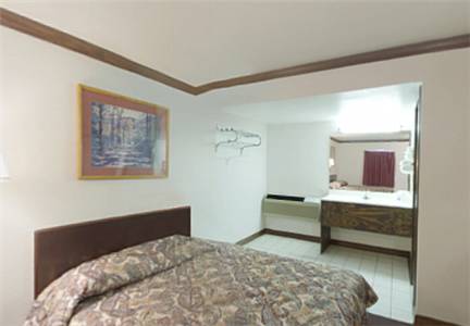 Imagen de la habitación del Hotel Executive Inn Muldrow. Foto 10