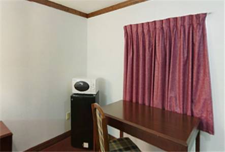 Imagen de la habitación del Hotel Executive Inn Muldrow. Foto 12