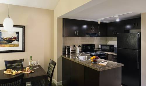 Imagen de la habitación del Hotel Executive Suites And Resort, Squamish. Foto 9