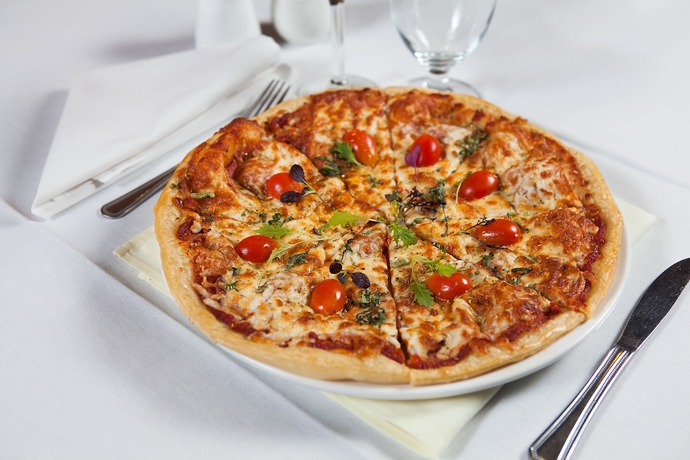 Imagen del bar/restaurante del Hotel Executive Suites Metro Vancouver. Foto 2