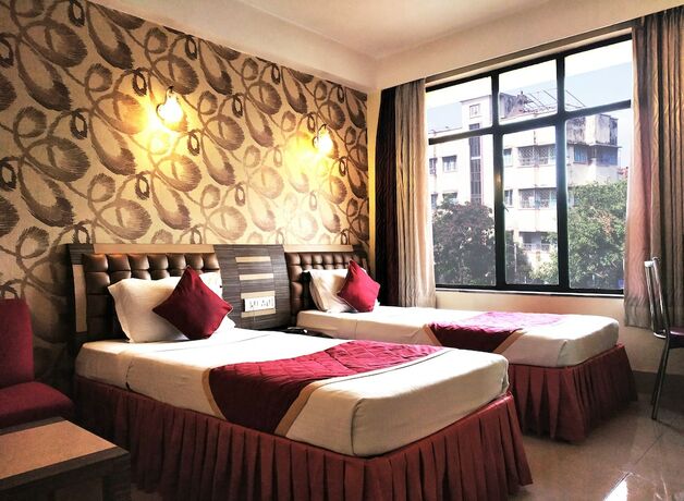 Imagen de la habitación del Hotel Executive Tower. Foto 16