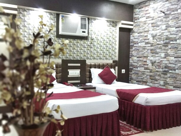 Imagen de la habitación del Hotel Executive Tower. Foto 24