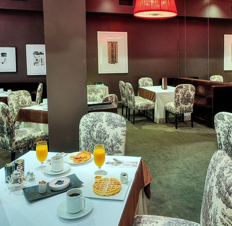 Imagen del bar/restaurante del Hotel Executive Vintage Court. Foto 1
