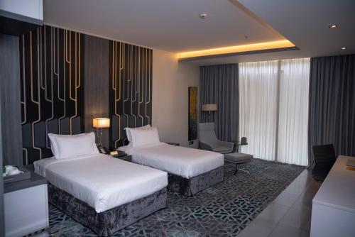 Imagen de la habitación del Hotel Executives - KAFD, AL MUGHRIZAT. Foto 18
