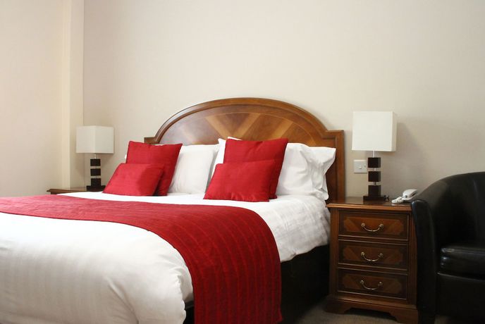 Imagen de la habitación del Hotel Exeter Court. Foto 10