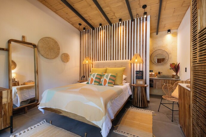 Imagen de la habitación del Hotel Exôtico Beach and Rooms. Foto 13