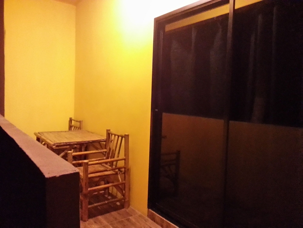 Imagen de la habitación del Hotel Exotic Bungalows. Foto 3